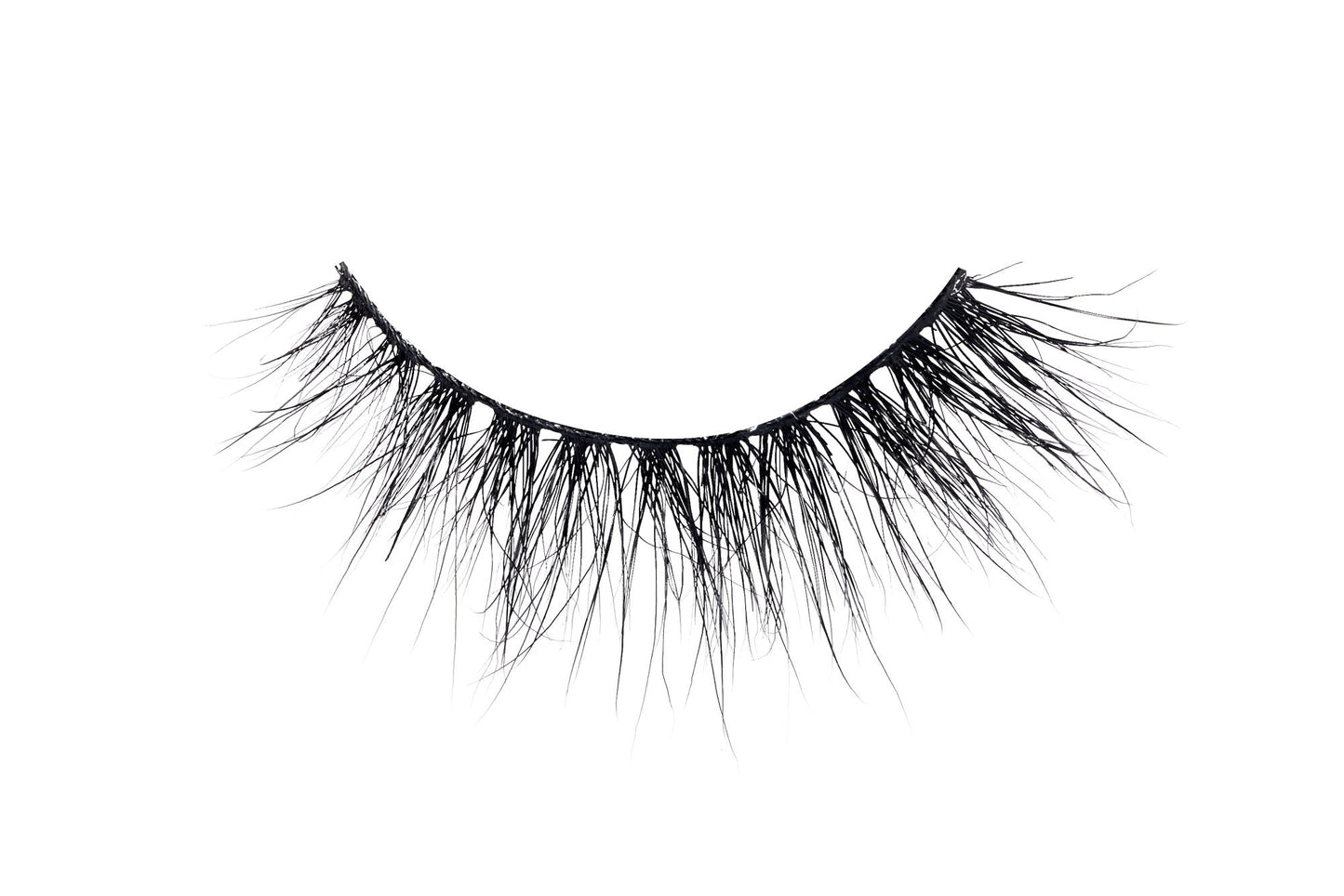 Luxurious F2 FEMI FATALE false lash with ultra-light, wispy fibers for a natural, fluffy, and bold look.
Close-up of F2 FEMI FATALE luxury false eyelash. Ethereal, ultra-light fibers for a bold day-to-night look.
F2 FEMI FATALE lash: bold, fluffy, and wispy luxury false eyelash.